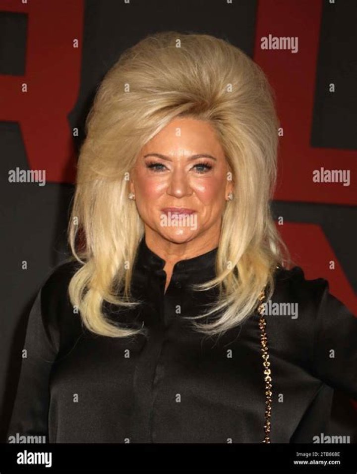 Long Island Medium Theresa Caputo, 55, celebrates New Year's Eve in a black mini dress after being s